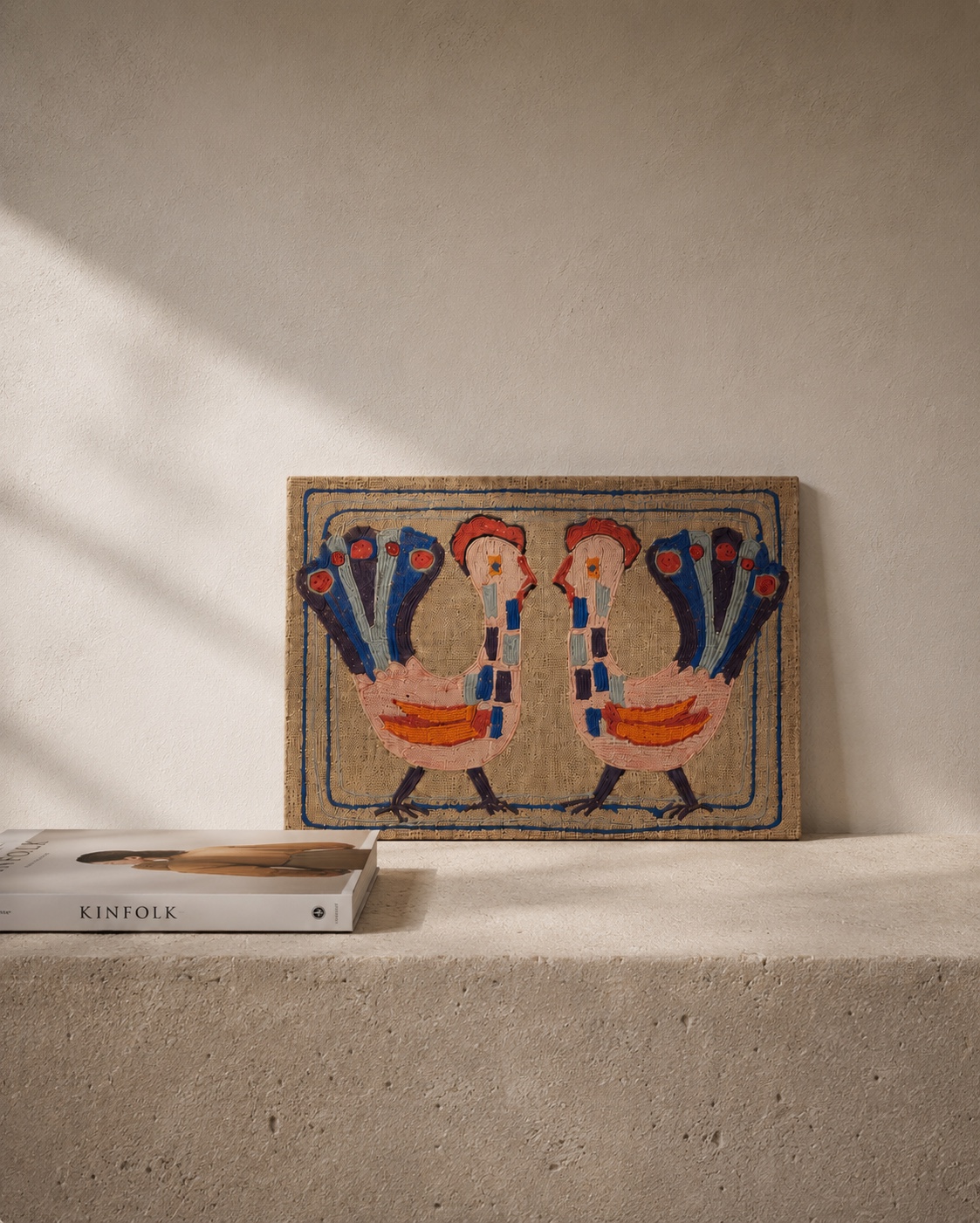 Scandinavian folk art yarn painting with two stylised birds